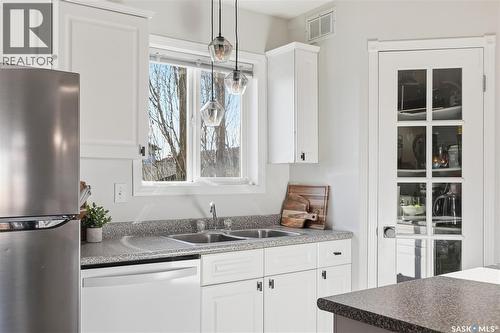 719 Rutherford Lane, Saskatoon, SK - Indoor Photo Showing Kitchen With Double Sink
