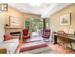 Recreation Room on lower level - gas fireplace and access to backyard patio - 