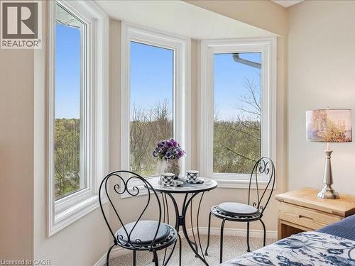 Bay window in Primary bedroom, perfect view of the sunrise while enjoying your morning coffee/tea. - 245 Bishop Street S Unit# 4, Cambridge, ON - Indoor