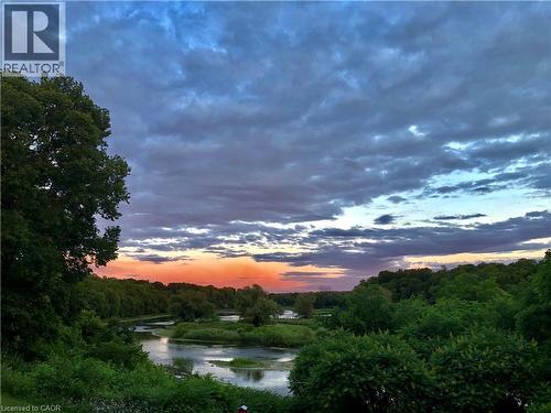 Incredible sunrises in the morning over The Grand River. - 245 Bishop Street S Unit# 4, Cambridge, ON - Outdoor With View
