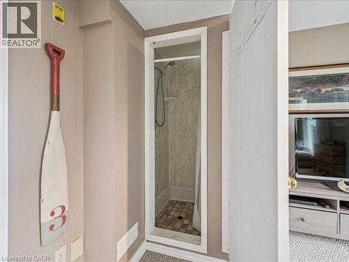 Walk-in shower featuring tiled walls and a coordinating tiled floor - 245 Bishop Street S Unit# 4, Cambridge, ON - Indoor