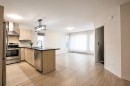 Salon - 4-6100 Rue De Champagnier, Brossard, QC  - Indoor Photo Showing Kitchen 