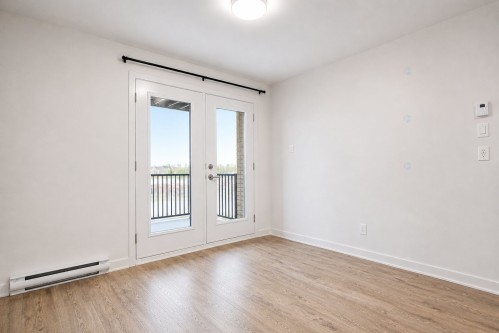 Chambre à coucher - 4-6100 Rue De Champagnier, Brossard, QC - Indoor Photo Showing Other Room