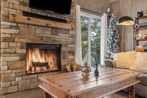 Living Room - 12 Imp. Du Chardonnet, Lac-Supérieur, QC - Indoor Photo Showing Living Room With Fireplace