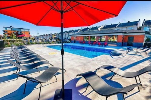 Pool - 305-3745 Av. Jean-Béraud, Laval (Chomedey), QC - Outdoor With In Ground Pool