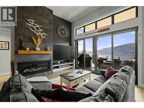 3663 Mckinley Beach Drive, Kelowna, BC - Indoor Photo Showing Living Room With Fireplace
