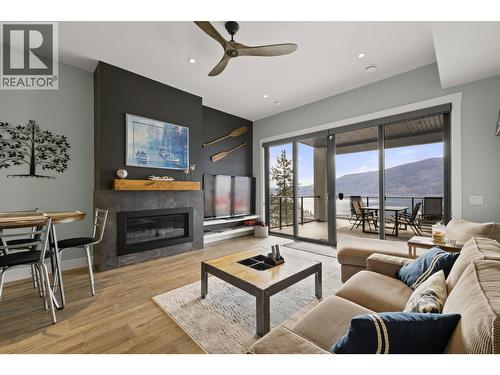 Suite - 3663 Mckinley Beach Drive, Kelowna, BC - Indoor Photo Showing Living Room With Fireplace