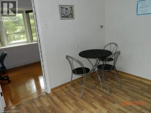 Wood-finish flooring provides a cohesive aesthetic - 134 Greenbrier Drive, Waterloo, ON - Indoor