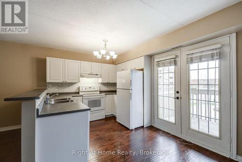 212 - 4005 Kilmer Drive, Burlington (Tansley), ON - Indoor Photo Showing Kitchen With Double Sink