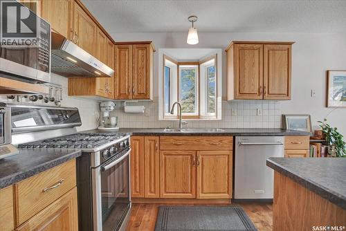 116 420 Heritage Crescent, Saskatoon, SK - Indoor Photo Showing Kitchen With Double Sink
