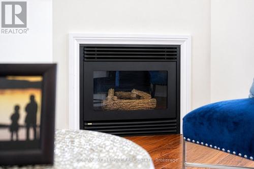 1 - 4920 Rathkeale Road, Mississauga, ON - Indoor Photo Showing Living Room With Fireplace