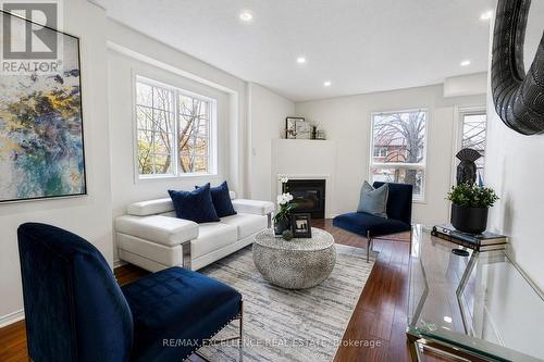1 - 4920 Rathkeale Road, Mississauga, ON - Indoor Photo Showing Living Room With Fireplace