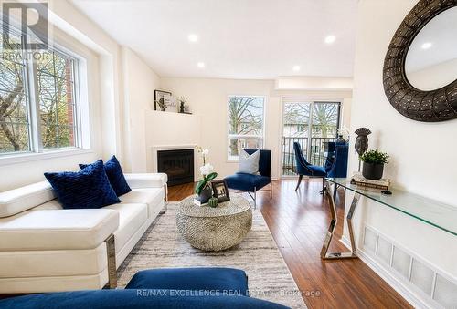 1 - 4920 Rathkeale Road, Mississauga, ON - Indoor Photo Showing Living Room With Fireplace