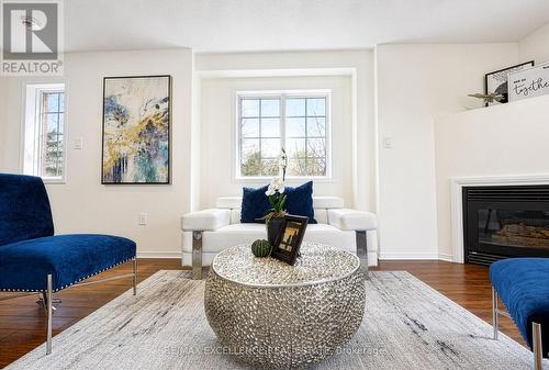 1 - 4920 Rathkeale Road, Mississauga, ON - Indoor Photo Showing Living Room With Fireplace