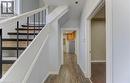 Staircase with wood finished floors and baseboards - 138 Courtland Avenue E, Kitchener, ON  - Indoor Photo Showing Other Room 