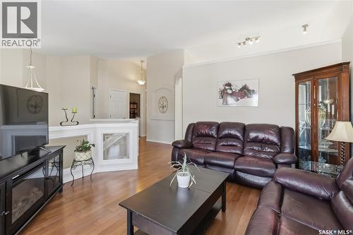 414 Adaskin Cove, Saskatoon, SK - Indoor Photo Showing Living Room With Fireplace