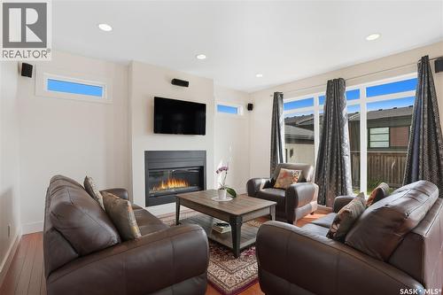 323 Atton Crescent, Saskatoon, SK - Indoor Photo Showing Living Room With Fireplace