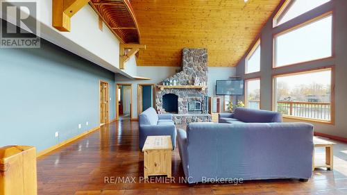 31 Paradise Boulevard, Ramara, ON - Indoor Photo Showing Living Room With Fireplace