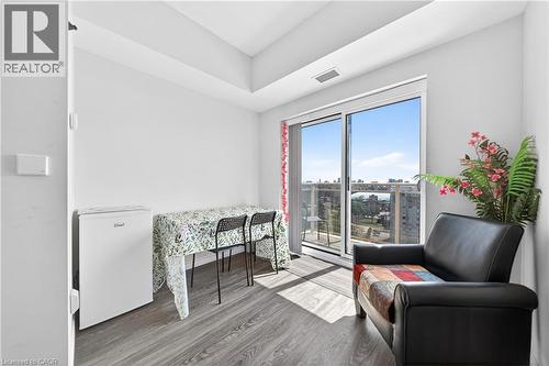 Sliding glass doors opening to a private balcony - 246 Lester Street Unit# Ph-03, Waterloo, ON - Indoor