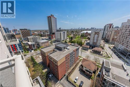 Expansive city skyline with a mix of high-rise and mid-rise buildings, featuring a distant domed structure - 246 Lester Street Unit# Ph-03, Waterloo, ON - Outdoor With View
