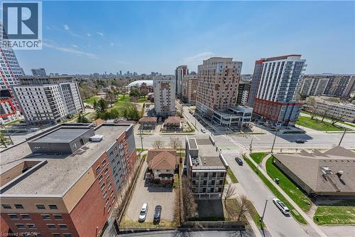 Urban landscape featuring a mix of high-rise buildings and commercial structures - 246 Lester Street Unit# Ph-03, Waterloo, ON - Outdoor With View