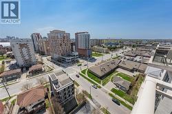Expansive aerial perspective showcasing a vibrant urban environment with diverse architectural styles, including multi-story residential buildings and commercial structures - 