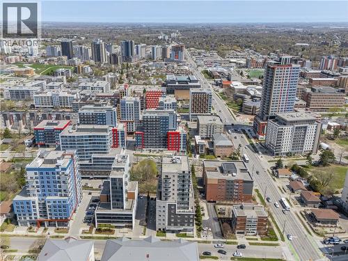Expansive urban landscape featuring contemporary high-rise developments, established tree canopy, and arterial roads - 246 Lester Street Unit# Ph-03, Waterloo, ON - Outdoor With View