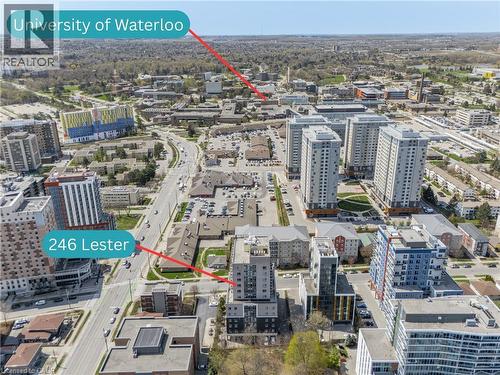 Aerial perspective showcasing a dense urban environment with multiple high-rise residential buildings - 246 Lester Street Unit# Ph-03, Waterloo, ON - Outdoor With View