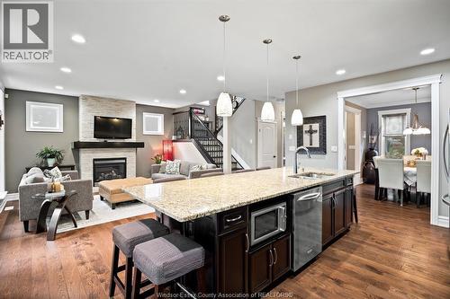 1265 Maple, Lasalle, ON - Indoor Photo Showing Kitchen With Fireplace With Upgraded Kitchen