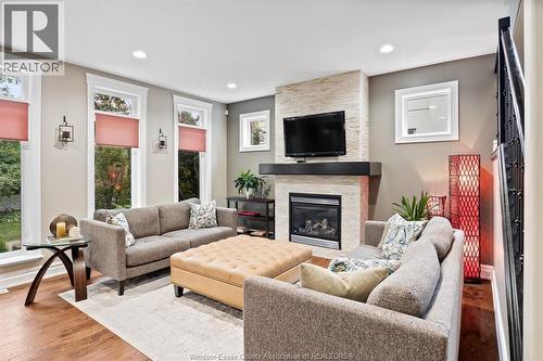 1265 Maple, Lasalle, ON - Indoor Photo Showing Living Room With Fireplace