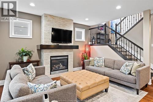 1265 Maple, Lasalle, ON - Indoor Photo Showing Living Room With Fireplace