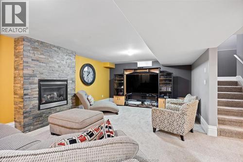 1265 Maple, Lasalle, ON - Indoor Photo Showing Living Room With Fireplace