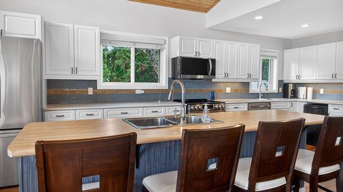 398 Currie Road, Baynes Lake, BC - Indoor Photo Showing Kitchen With Double Sink