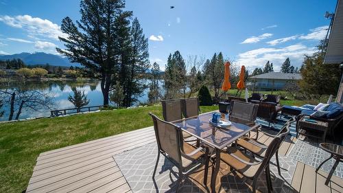 398 Currie Road, Baynes Lake, BC - Outdoor With Body Of Water With Deck Patio Veranda With View