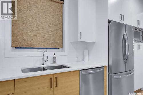 230 Greyeyes-Steele Way, Saskatoon, SK - Indoor Photo Showing Kitchen With Double Sink