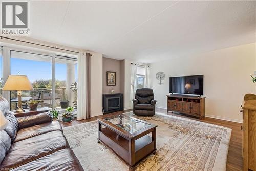 8 Christopher Court Unit# 507, Guelph, ON - Indoor Photo Showing Living Room With Fireplace