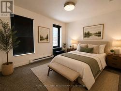 3 - 261 QUEEN STREET W  Toronto, ON M5V 1Z4