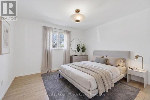 Virtually Staged - 32 Tiny Beaches Road S, Tiny, ON - Indoor Photo Showing Bedroom