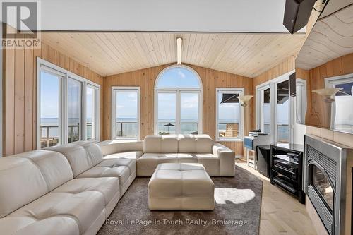 32 Tiny Beaches Road S, Tiny, ON - Indoor Photo Showing Living Room With Fireplace