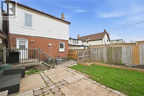 Exterior blocks newly painted - 46 Mayflower Avenue, Hamilton, ON - Outdoor With Deck Patio Veranda With Exterior