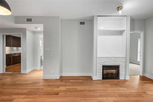 #113-1400 Lynburne Pl, Langford, BC - Indoor Photo Showing Living Room With Fireplace