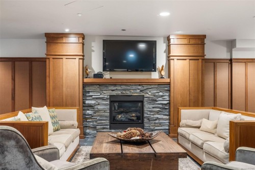 #113-1400 Lynburne Pl, Langford, BC - Indoor Photo Showing Living Room With Fireplace