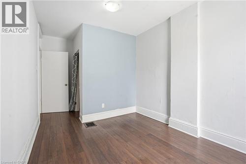 Hardwood-style flooring throughout - 137 Market Street, Hamilton, ON - Indoor Photo Showing Other Room