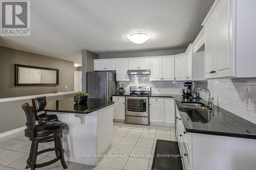 21 - 605 Welland Avenue, St. Catharines (Carlton/Bunting), ON - Indoor Photo Showing Kitchen With Double Sink