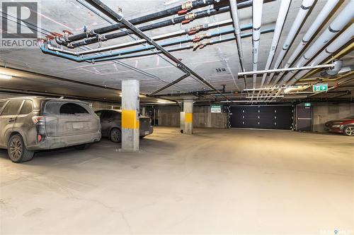 122 223 Evergreen Square, Saskatoon, SK - Indoor Photo Showing Garage