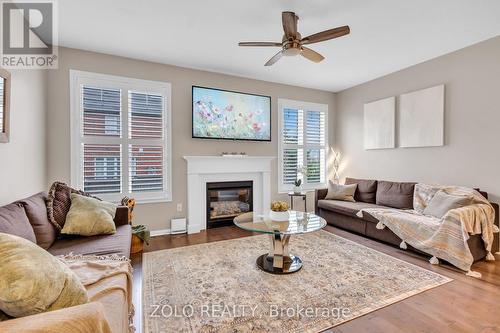 304 Leiterman Drive, Milton, ON - Indoor Photo Showing Living Room With Fireplace
