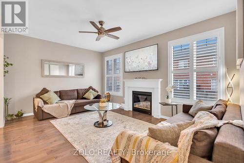 304 Leiterman Drive, Milton, ON - Indoor Photo Showing Living Room With Fireplace