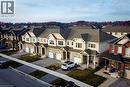 Modern townhome featuring stone and siding exterior construction - 111 Alicia Crescent, Thorold, ON 