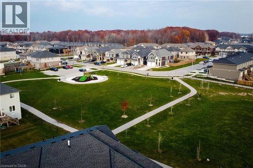 Expansive green space featuring a playground structure and paved walking paths - 111 Alicia Crescent, Thorold, ON 