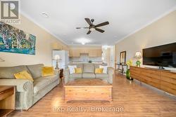 Bright Living Room with Ceiling Fan - 